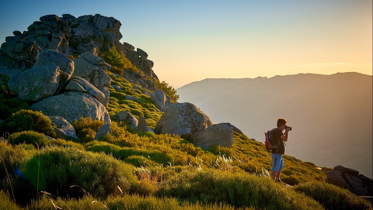 photographer in Peña Negra, at sunset