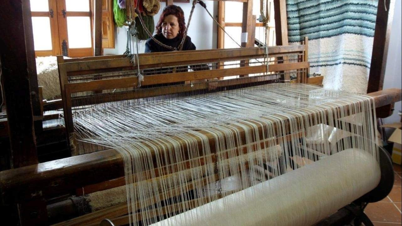 Woman working in textile handicraft