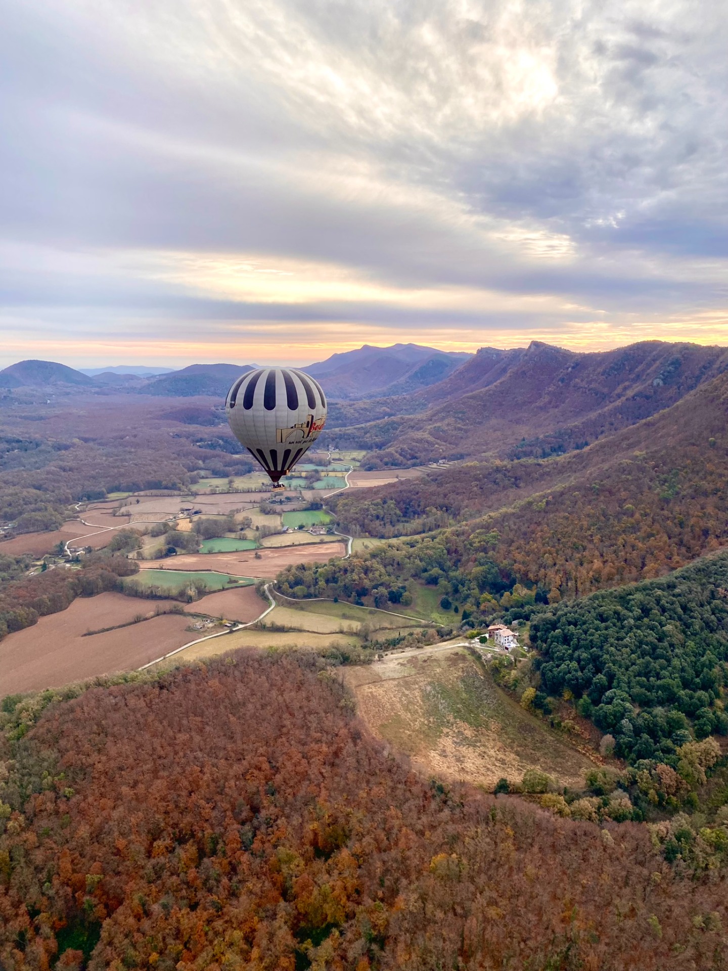  Balloon in the sky with forest and mountain scenery
