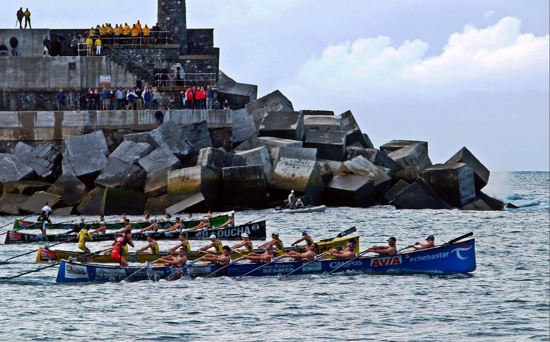 three canoe teams in the sea racing
